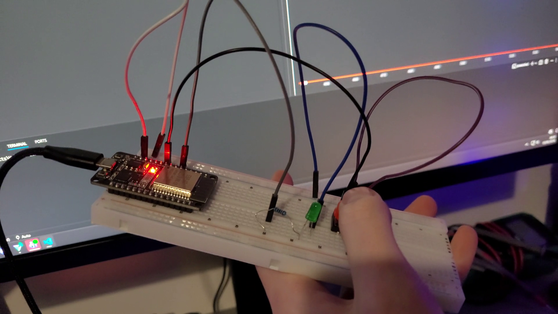 LED lighting up as a button is pressed